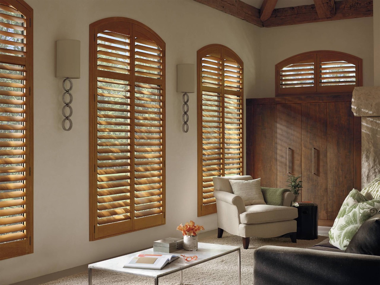 Hunter Douglas arched window treatments in a living room near Fairfax, VA